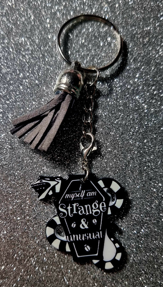 Strange and Unusual Keychain